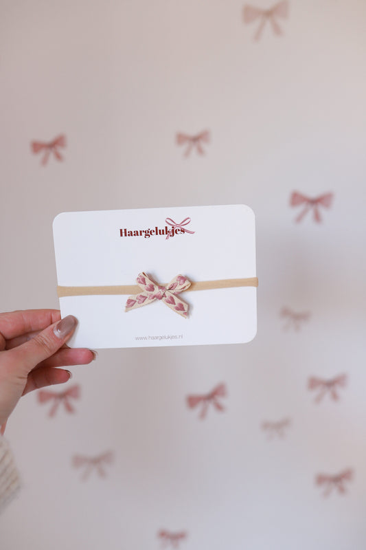 Haarbandjes - strikje hartjes roze